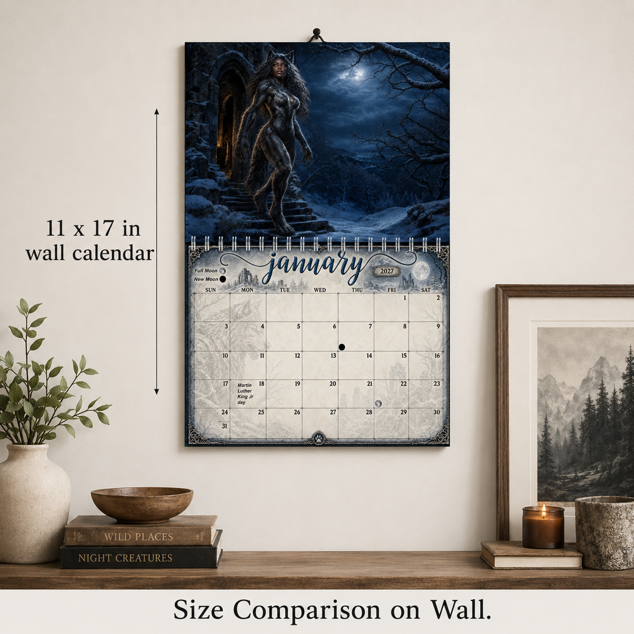 Size comparison of the 11x17 inch Moonbound Pack wall calendar hanging on a wall above a wooden shelf