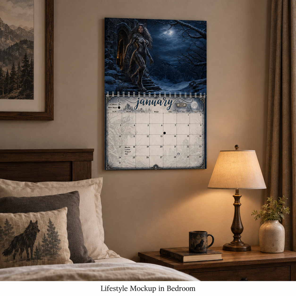 The Moonbound Pack 2027 wall calendar displayed on a bedroom wall beside a nightstand and lamp