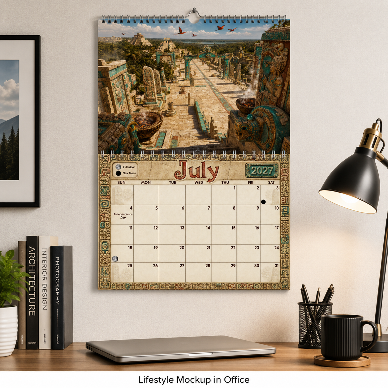 Ancient Mayan Wall Calendar 2027 displayed on an office wall above a desk with a laptop